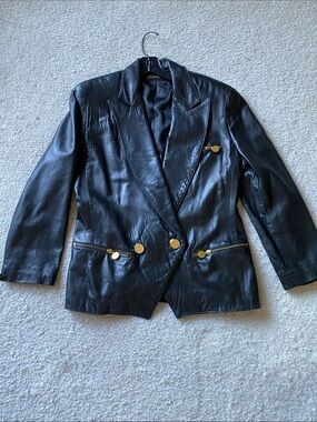 Donna Karan vintage black leather jacket with gold buttons and zippers, size 8